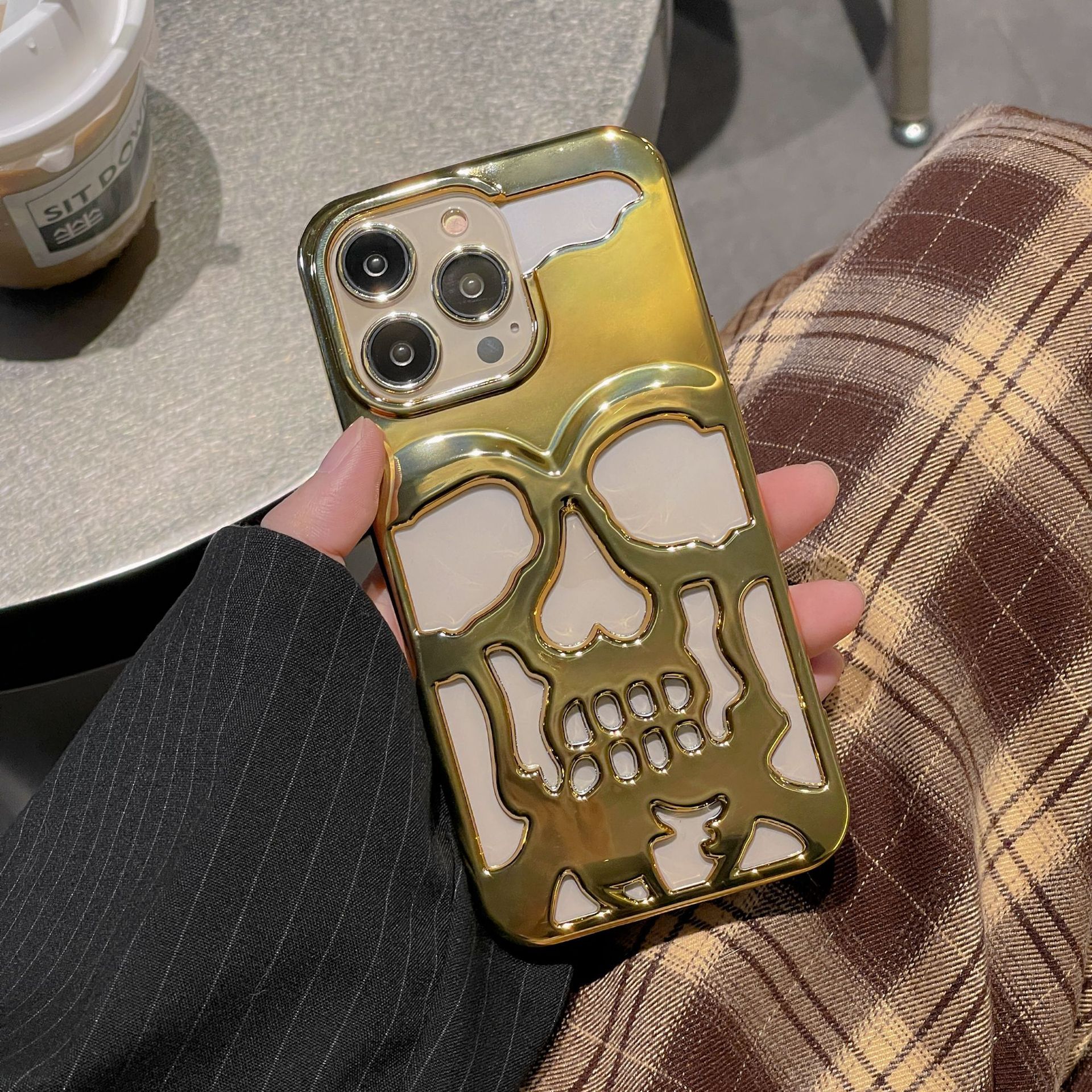 3D skull phone case featuring a unique design and shiny finish for a stylish look