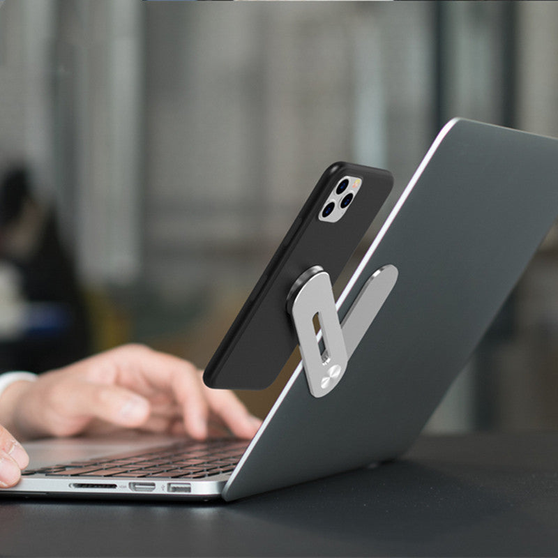 Adjustable flat expansion bracket for secure smartphone support on laptops and tables