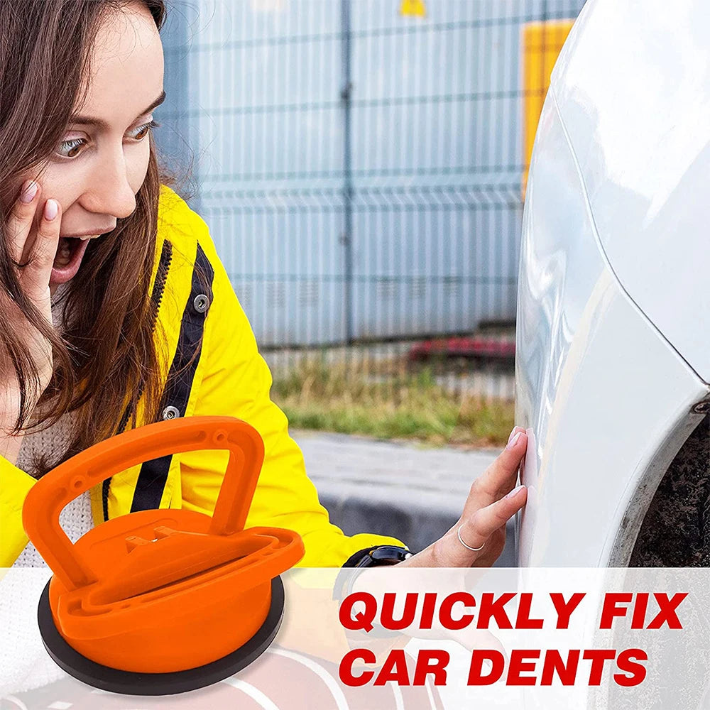 Car dent repair suction cup in orange for quickly fix car dents with easy handling