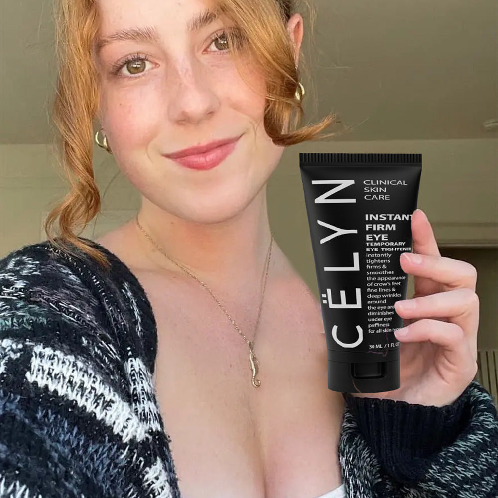 Celyn Instant Firm Eye Cream for under-eye bag removal cream in a woman's hand with a natural smile