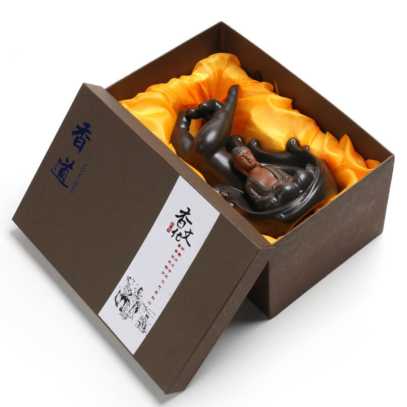 Creative incense burner elegantly presented in a decorative box with soft orange lining