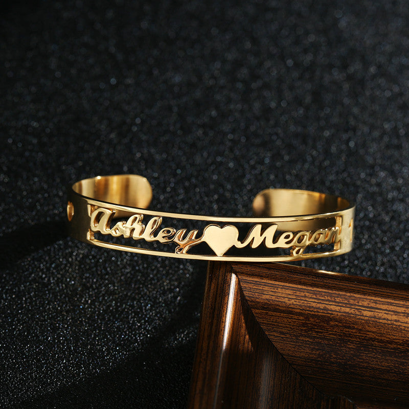 Custom name bracelet in gold with heartfelt names Ashley and Megan beautifully engraved