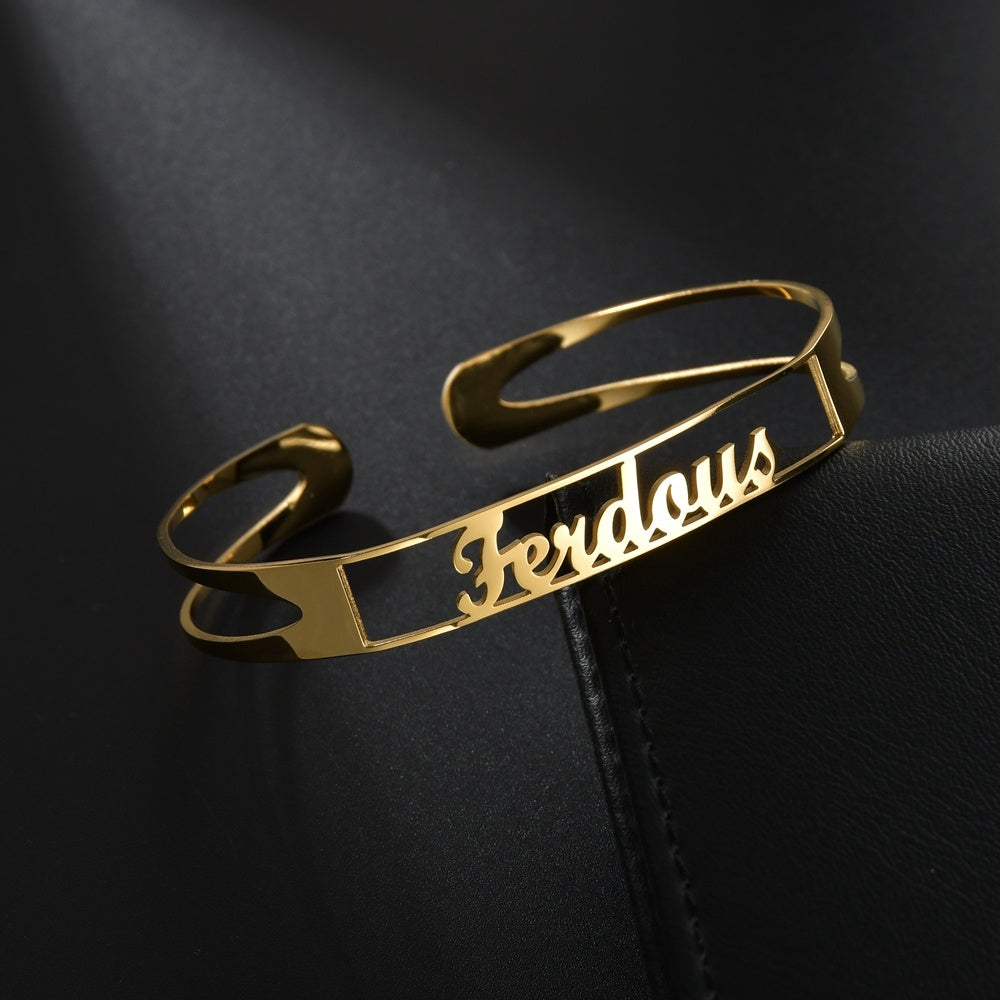 Gold custom name bracelet featuring the name Ferdous in elegant cursive design