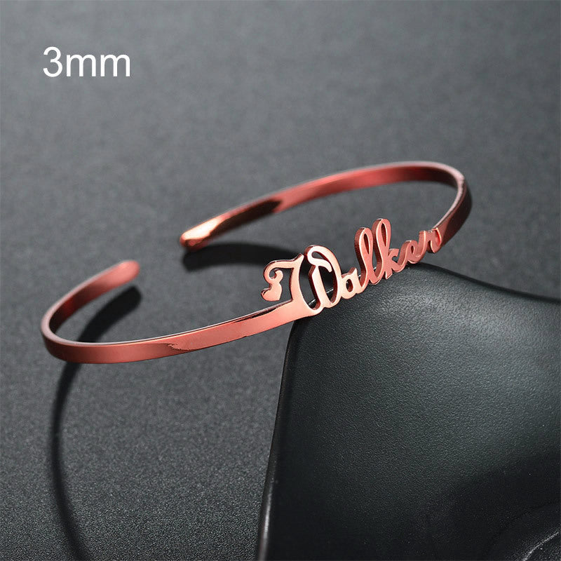Custom name bracelet in rose gold with elegant cursive lettering for personalized style