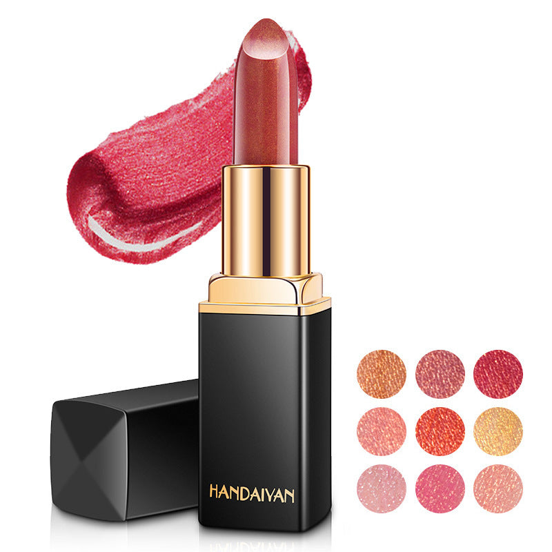 Handaiyan color-changing lipstick in a sleek black tube with swatches of vibrant shades beside it