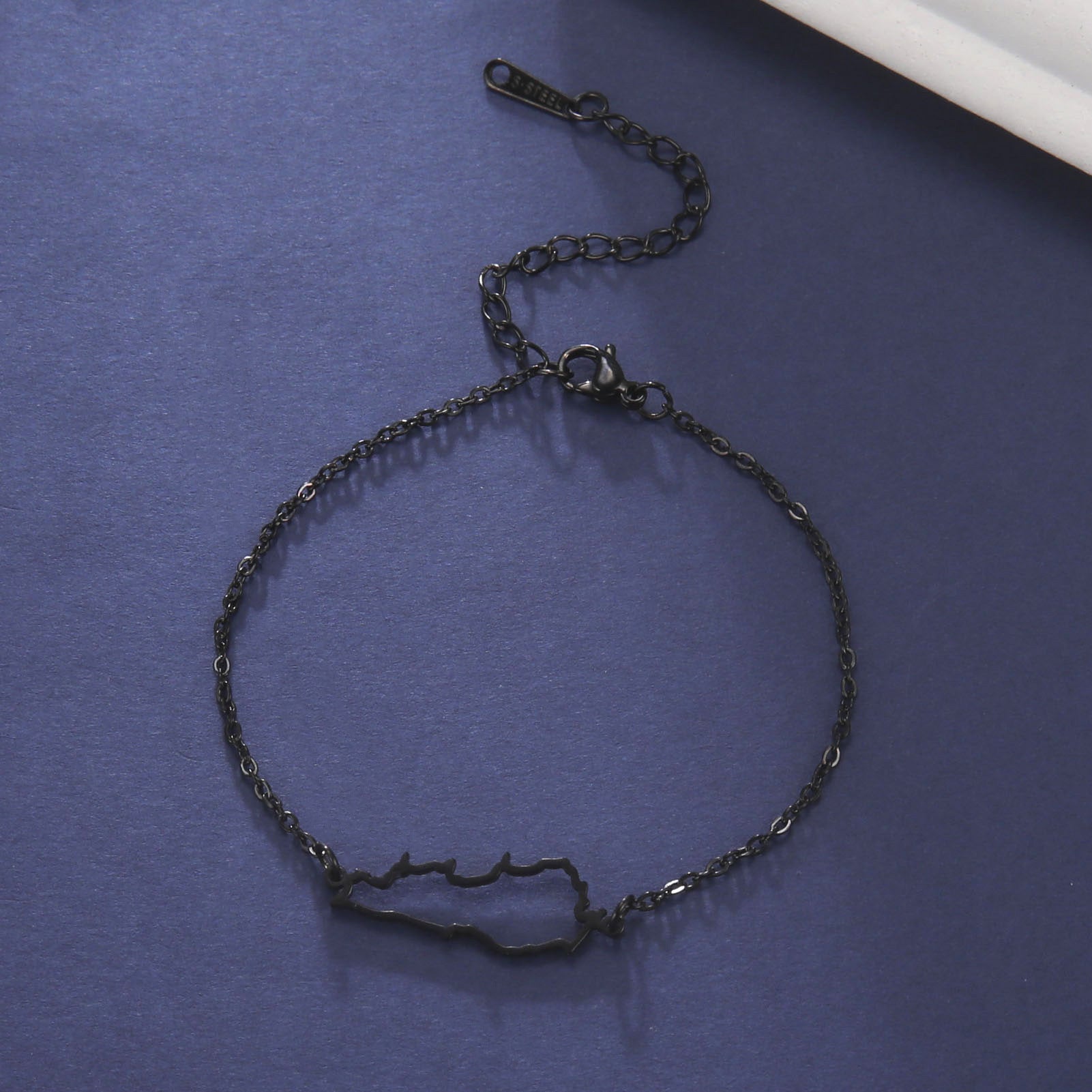 Hollow Lebanon map bracelet in black metal, stylish accessory for travelers and map enthusiasts