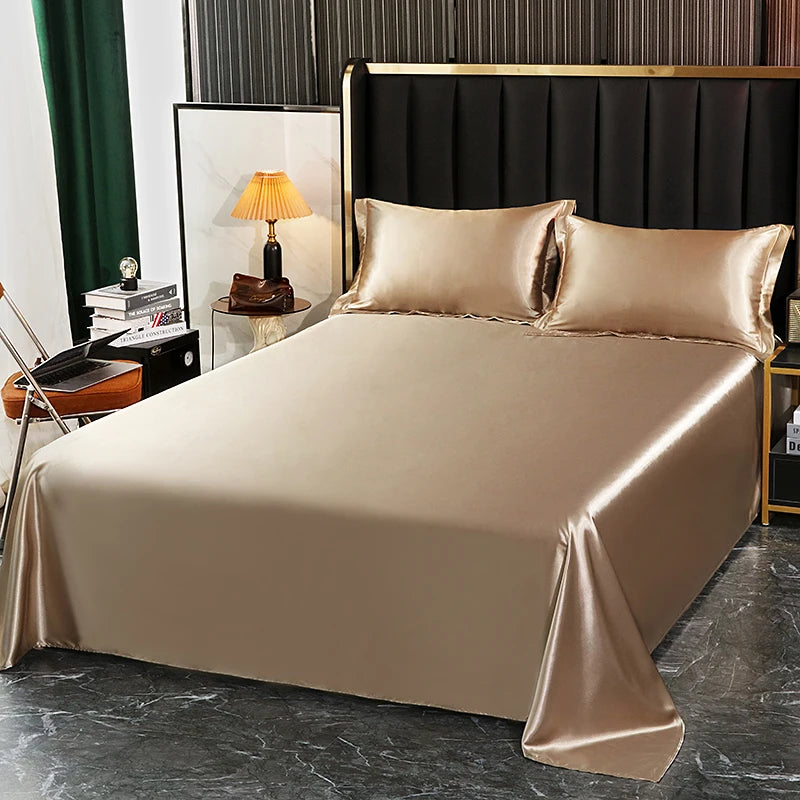 Luxury satin bedding set in golden beige on a stylish bed for elegant bedroom decor