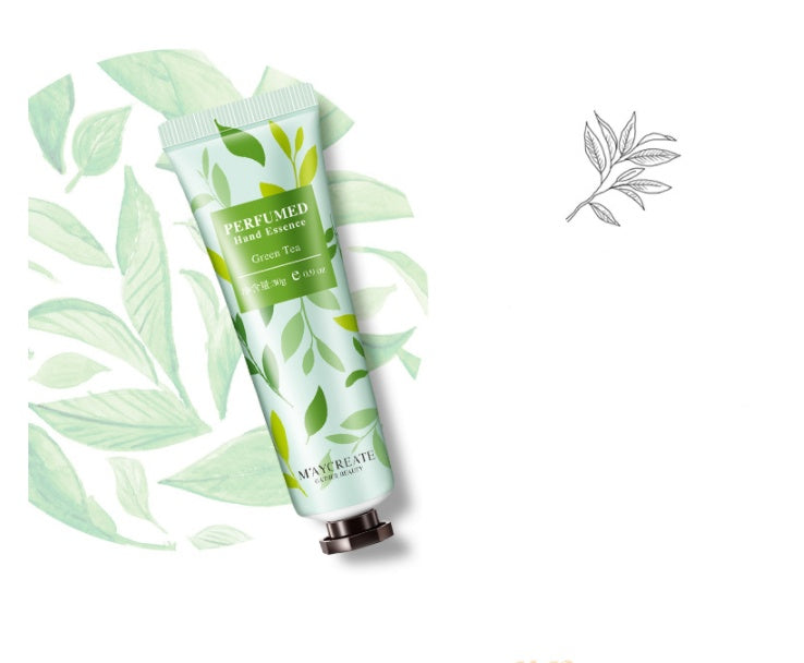 Plant essence hand cream in green tea scent, featuring a botanical design on the tube