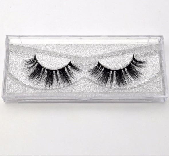 Long-lasting faux lashes in a sleek case, perfect for adding volume and glamour to any makeup look
