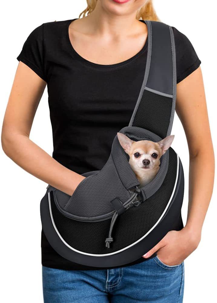 Portable pet carrier bag in black for small pets with adjustable strap and breathable mesh design