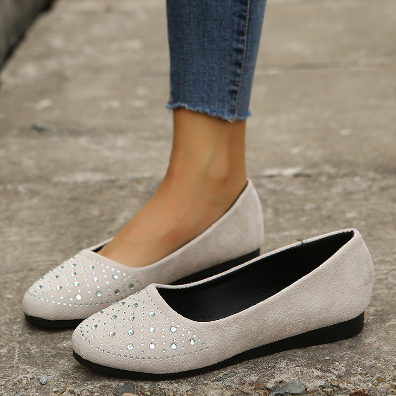 Beige rhinestone flats for women featuring sparkling embellishments and a comfortable design