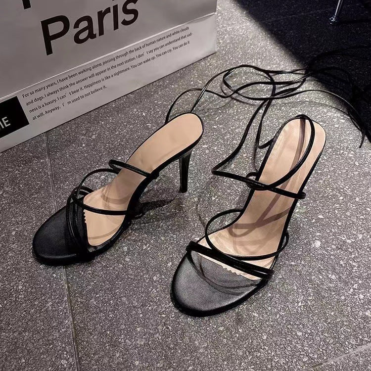 Elegant black round toe stiletto heels with stylish straps for women from youbuyforme