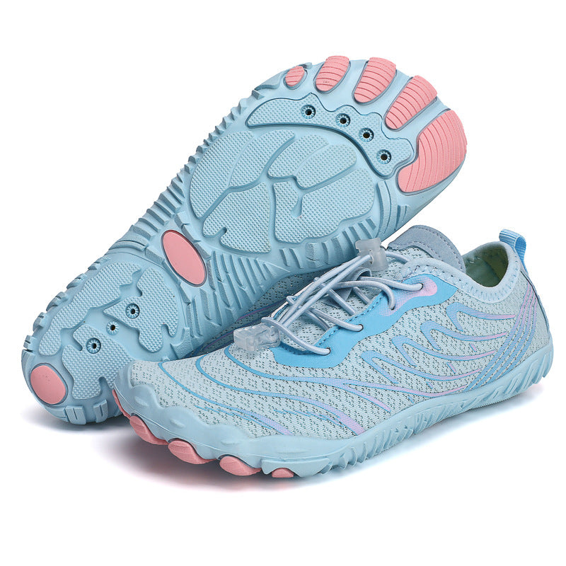 Light blue trekking non-slip shoes with secure lacing and textured sole for outdoor adventures.