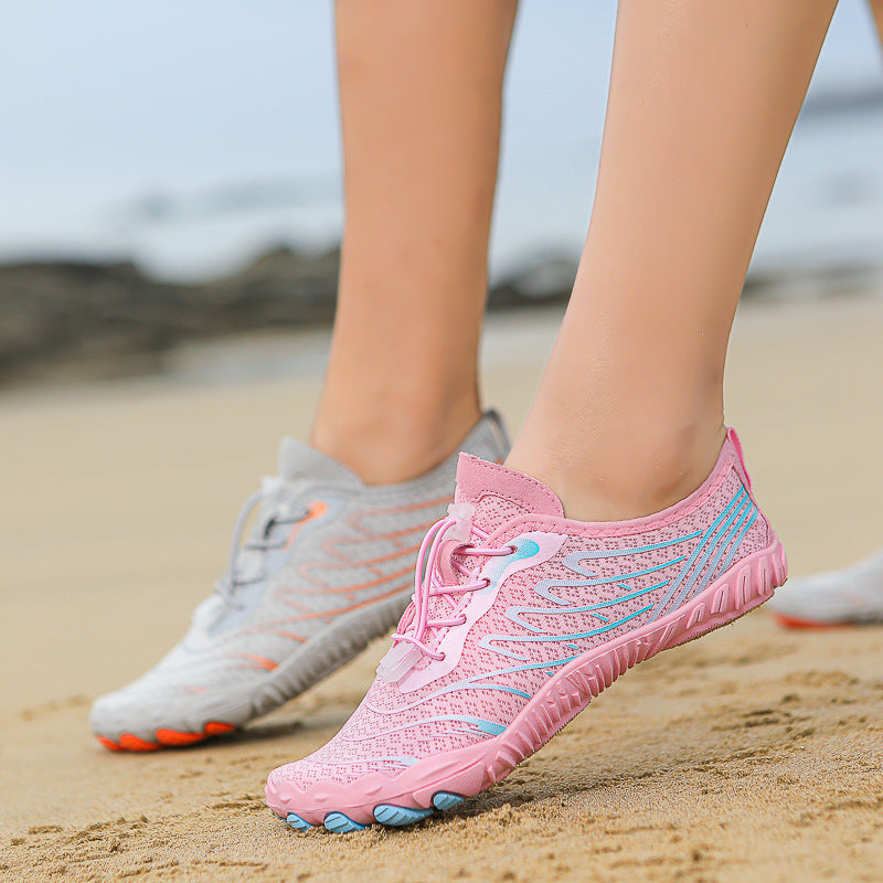 Women trekking non-slip shoes in pink and grey for beach and outdoor activities
