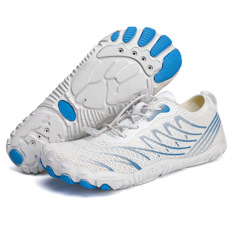 White trekking non-slip shoes with breathable mesh and durable rubber sole for outdoor adventures