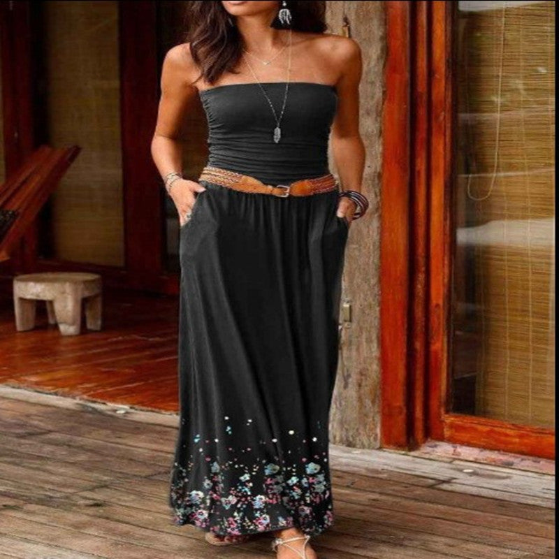 Elegant tube long women dress in black with floral design and pockets, perfect for casual outings