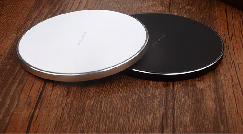 You Buy For Me wireless fast charge pad in black and white for convenient device charging